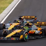 Oscar Piastri intenta un sobrepaso arriesgado a Lando Norris sin contacto en el GP de Hungría 2025.